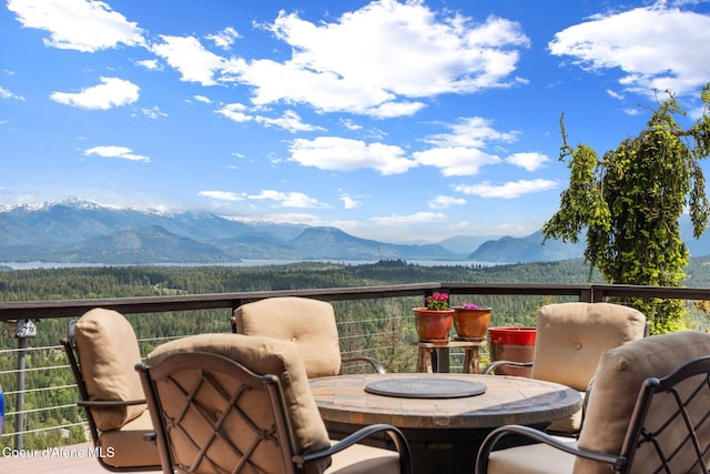 295 Sky Meadow Ln, Sagle, ID 83860 - wooden terrace featuring a mountain view