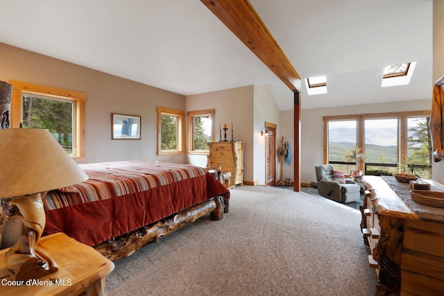 295 Sky Meadow Ln, Sagle, ID 83860 - carpeted bedroom with access to outside, a skylight, and beam ceiling