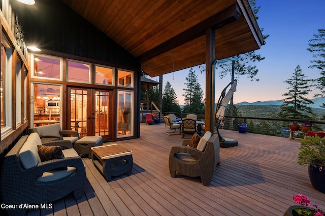 295 Sky Meadow Ln, Sagle, ID 83860 - wooden deck with french doors and an outdoor living space
