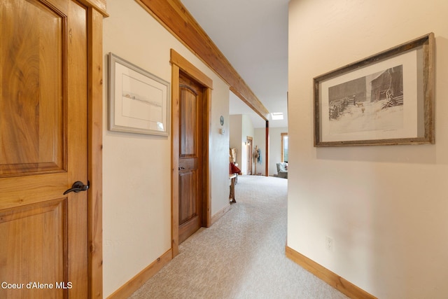 295 Sky Meadow Ln, Sagle, ID 83860 - hallway featuring light colored carpet and baseboards