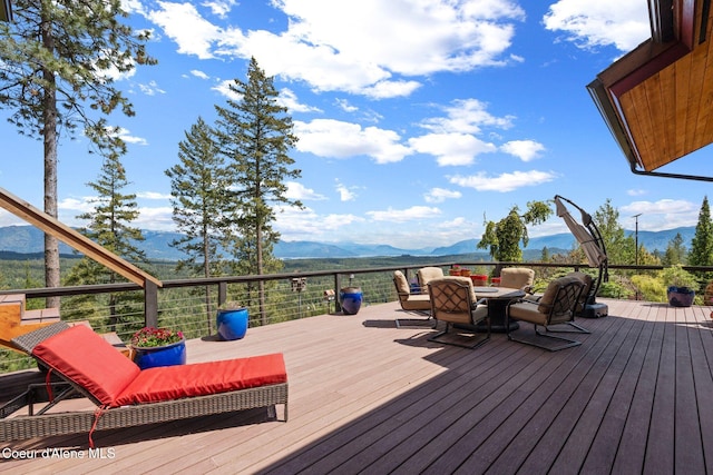 295 Sky Meadow Ln, Sagle, ID 83860 - wooden terrace featuring a mountain view