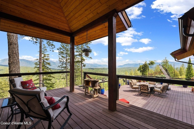295 Sky Meadow Ln, Sagle, ID 83860 - wooden deck featuring outdoor lounge area and a mountain view