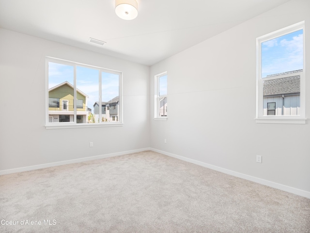 998 E Railroad Ave, Post Falls, ID 83854 - carpeted empty room featuring baseboards