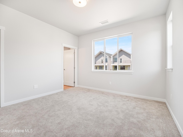 998 E Railroad Ave, Post Falls, ID 83854 - carpeted spare room with baseboards