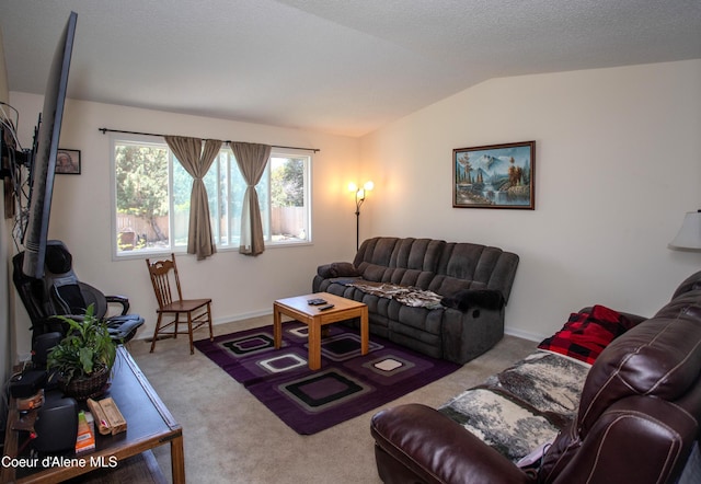 3420 E Poleline Ave, Post Falls, ID 83854 - living area featuring carpet floors, vaulted ceiling, and baseboards