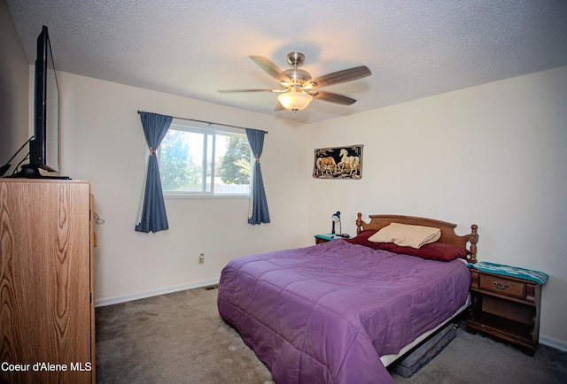 3420 E Poleline Ave, Post Falls, ID 83854 - bedroom with carpet flooring, a textured ceiling, ceiling fan, and baseboards