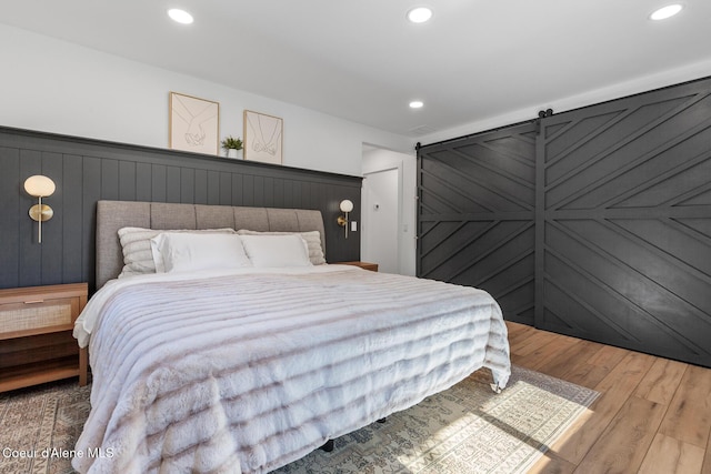 1113 N Lambert Ln, Coeur Dalene, ID 83814 - bedroom with wood finished floors and recessed lighting
