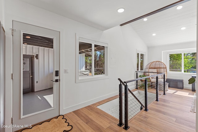 1113 N Lambert Ln, Coeur Dalene, ID 83814 - hallway with an upstairs landing, recessed lighting, lofted ceiling, light wood-style flooring, and baseboards