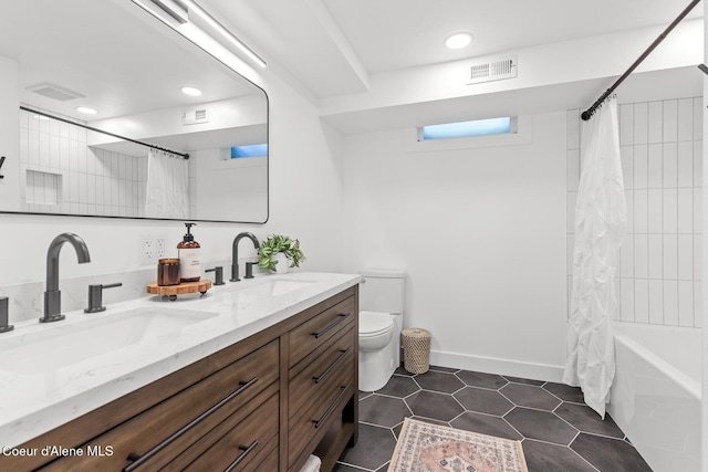 1113 N Lambert Ln, Coeur Dalene, ID 83814 - bathroom featuring double vanity, tile patterned floors, shower / bathtub combination with curtain, toilet, and recessed lighting