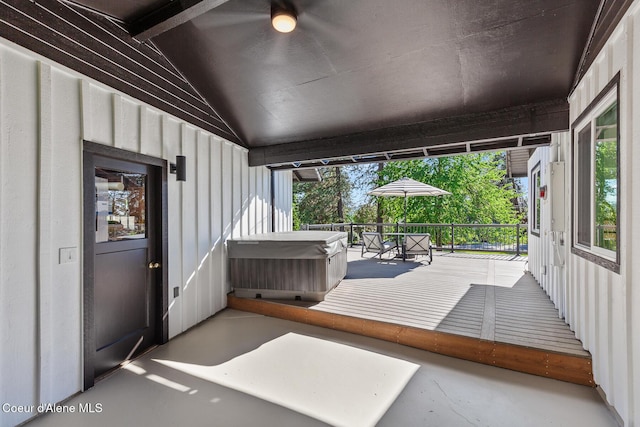 1113 N Lambert Ln, Coeur Dalene, ID 83814 - sunroom / solarium with a hot tub, lofted ceiling, and a ceiling fan