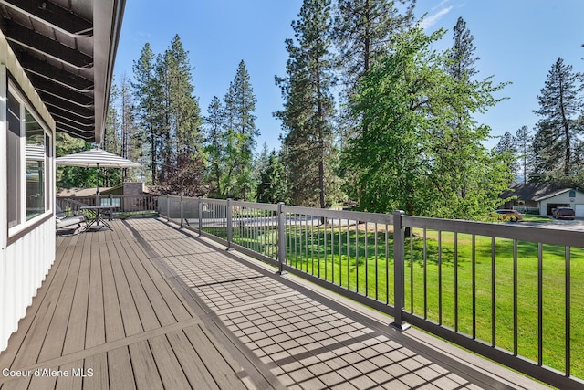 1113 N Lambert Ln, Coeur Dalene, ID 83814 - deck with a yard and view of scattered trees