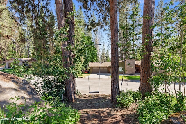 1113 N Lambert Ln, Coeur Dalene, ID 83814 - exterior space with driveway