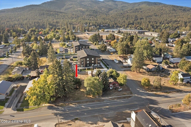 504 E 3rd Ave, Post Falls, ID 83854 - view of property location with a forest, mountains, and nearby suburban area
