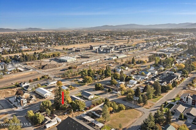 504 E 3rd Ave, Post Falls, ID 83854 - aerial view of property and surrounding area with a mountainous background