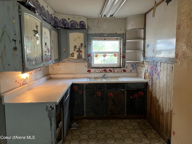 504 E 3rd Ave, Post Falls, ID 83854 - kitchen featuring a sink, light countertops, and open shelves