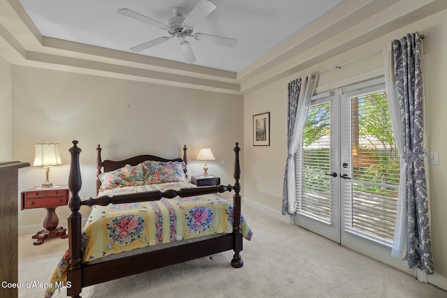 8511 N Summerfield Loop, Hayden, ID 83835 - carpeted bedroom with access to exterior, a raised ceiling, baseboards, ceiling fan, and french doors