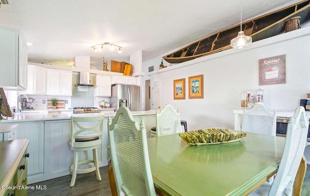 5820 E Steamboat Bnd, Post Falls, ID 83854 - dining space featuring dark wood-style flooring