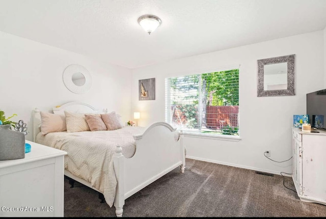5820 E Steamboat Bnd, Post Falls, ID 83854 - carpeted bedroom featuring baseboards