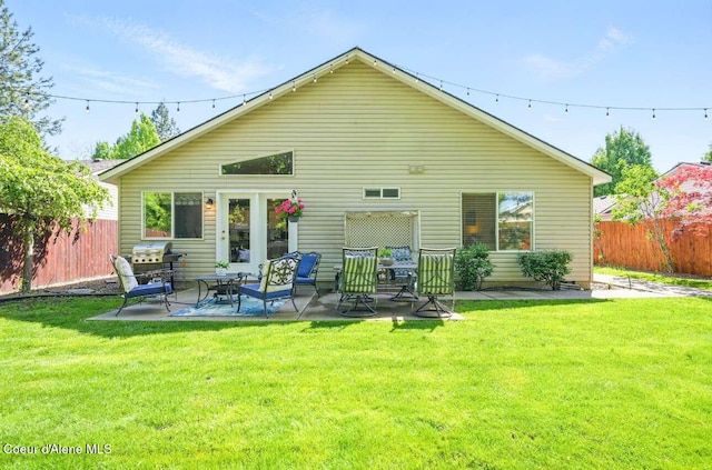 5820 E Steamboat Bnd, Post Falls, ID 83854 - back of property with a patio