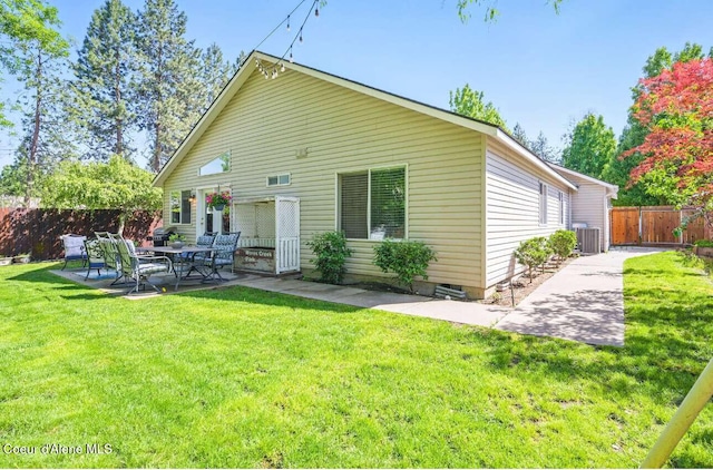 5820 E Steamboat Bnd, Post Falls, ID 83854 - rear view of property featuring a patio area and central air condition unit