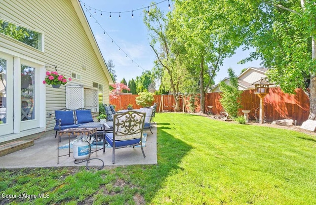 5820 E Steamboat Bnd, Post Falls, ID 83854 - view of yard featuring a patio and outdoor lounge area