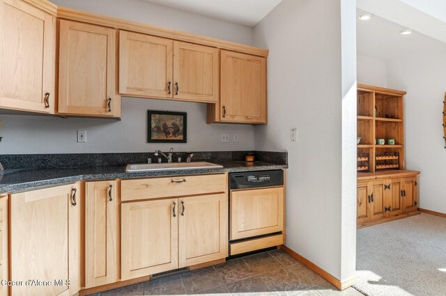 227 Crystal Springs Rd # 3, Sandpoint, ID 83864 - kitchen with paneled dishwasher, light brown cabinets, a sink, dark countertops, and baseboards