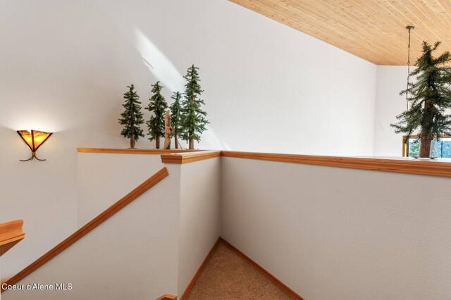 227 Crystal Springs Rd # 3, Sandpoint, ID 83864 - hall with carpet, wooden ceiling, and baseboards
