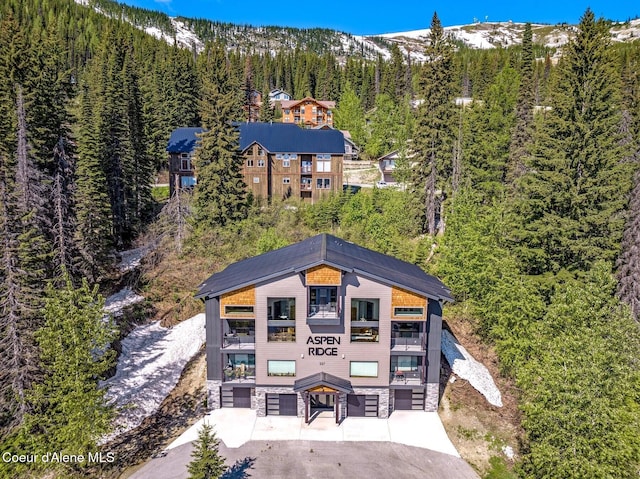 227 Crystal Springs Rd # 3, Sandpoint, ID 83864 - view of subject property featuring a heavily wooded area and mountains