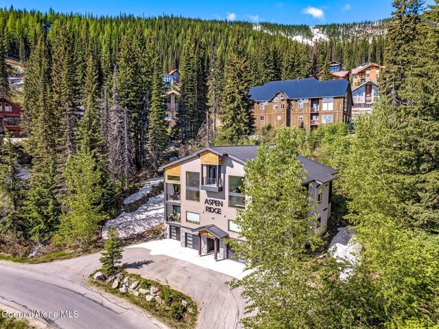 227 Crystal Springs Rd # 3, Sandpoint, ID 83864 - view of subject property with a forest