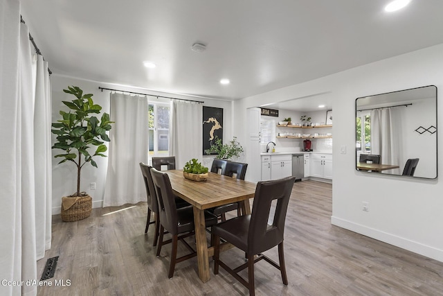 901 N 16th St, Coeur Dalene, ID 83814 - dining room with wood finished floors, baseboards, and recessed lighting