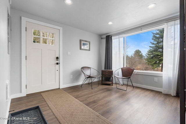228 Snowgoose Ln Unit 8, Sandpoint, ID 83864 - foyer entrance featuring wood finished floors, plenty of natural light, baseboards, and recessed lighting