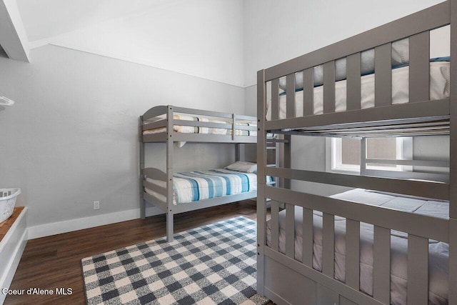 228 Snowgoose Ln Unit 8, Sandpoint, ID 83864 - bedroom with wood finished floors and baseboards