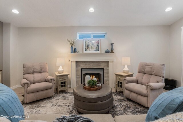 5835 E Steamboat Bnd, Post Falls, ID 83854 - living area featuring recessed lighting, a premium fireplace, baseboards, and wood finished floors