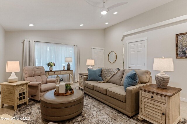 5835 E Steamboat Bnd, Post Falls, ID 83854 - living room featuring ceiling fan, recessed lighting, lofted ceiling, wood finished floors, and baseboards