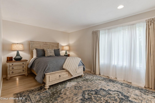 5835 E Steamboat Bnd, Post Falls, ID 83854 - bedroom featuring wood finished floors, baseboards, and recessed lighting