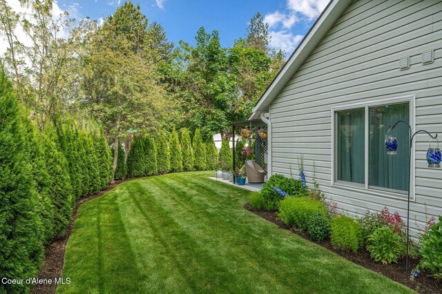 5835 E Steamboat Bnd, Post Falls, ID 83854 - view of grassy yard