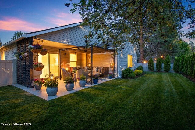 5835 E Steamboat Bnd, Post Falls, ID 83854 - rear view of property with a patio
