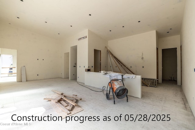 2193 W Bellerive Ln, Coeur Dalene, ID 83814 - unfurnished living room with a high ceiling