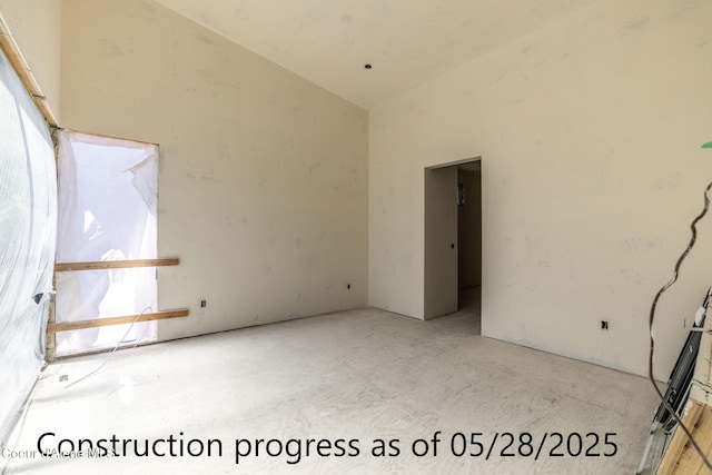 2193 W Bellerive Ln, Coeur Dalene, ID 83814 - unfurnished room featuring vaulted ceiling and plenty of natural light