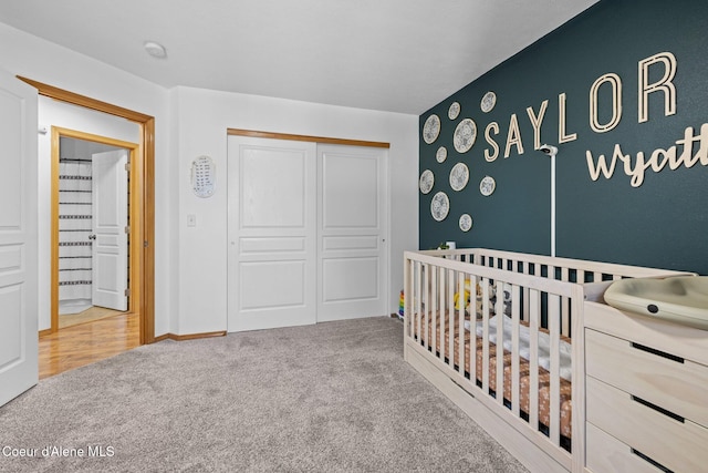 688 N Sparklewood Ct, Post Falls, ID 83854 - carpeted bedroom featuring a closet and a nursery area