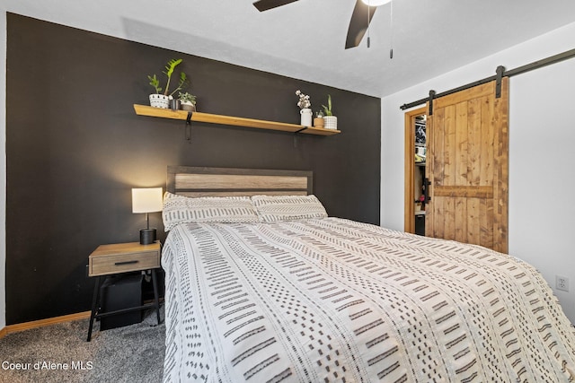 688 N Sparklewood Ct, Post Falls, ID 83854 - bedroom featuring carpet floors, a barn door, a ceiling fan, and baseboards