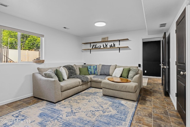 688 N Sparklewood Ct, Post Falls, ID 83854 - living area with stone tile flooring and baseboards