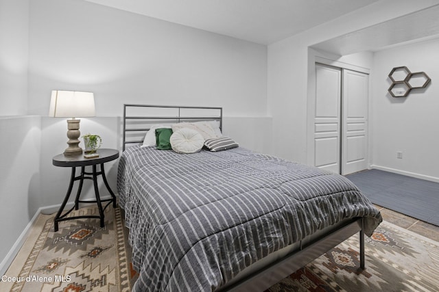688 N Sparklewood Ct, Post Falls, ID 83854 - bedroom with baseboards and a closet