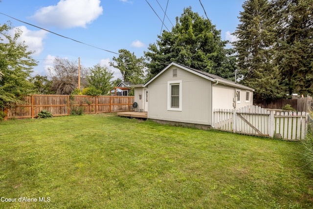 1409 E Birch Ave, Coeur Dalene, ID 83814 - view of yard featuring a deck