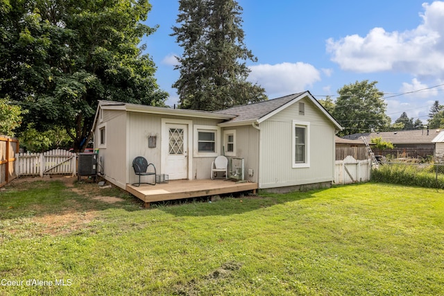 1409 E Birch Ave, Coeur Dalene, ID 83814 - rear view of property with a wooden deck, central AC unit, a gate, and roof with shingles