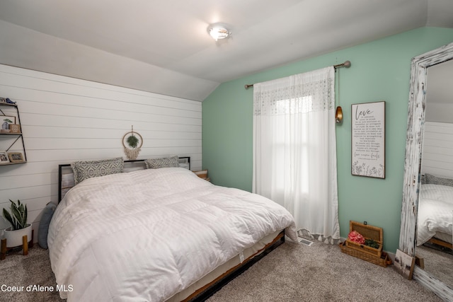 1409 E Birch Ave, Coeur Dalene, ID 83814 - bedroom with lofted ceiling and carpet flooring