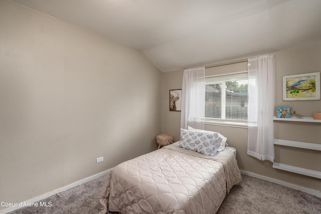 1409 E Birch Ave, Coeur Dalene, ID 83814 - bedroom featuring carpet floors, lofted ceiling, and baseboards