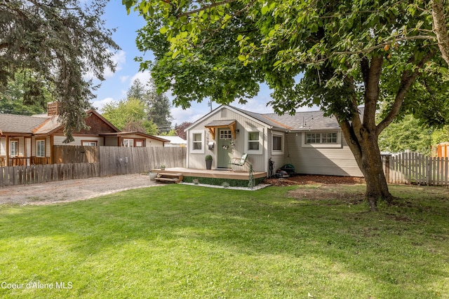 1409 E Birch Ave, Coeur Dalene, ID 83814 - rear view of house with a deck