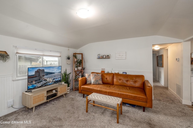 1409 E Birch Ave, Coeur Dalene, ID 83814 - living area with vaulted ceiling, carpet floors, and a wainscoted wall