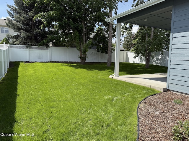 9151 N Raintree Ln, Hayden, ID 83835 - view of yard with a patio